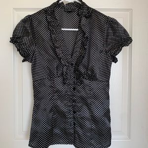 Iz polka dot ruffle button up.  Sz small